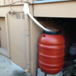 Hooking Up A Rain Barrel To The Gutter Rain Barrel Rain Barrel