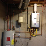 Tankless with storage tank and circulation pump Tom Kris Sons Plumbing