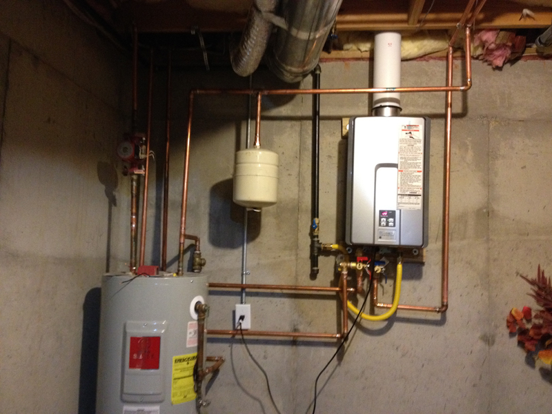 Tankless with storage tank and circulation pump Tom Kris Sons Plumbing